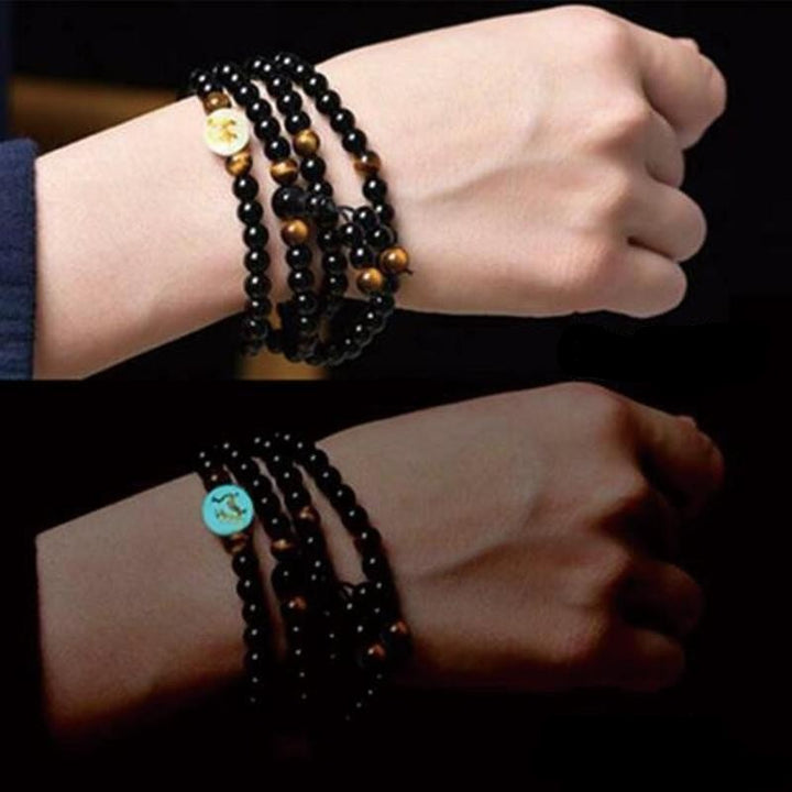 Lysande drakarmband i äkta svart obsidian natursten. För andligt skydd, healing och styrka.