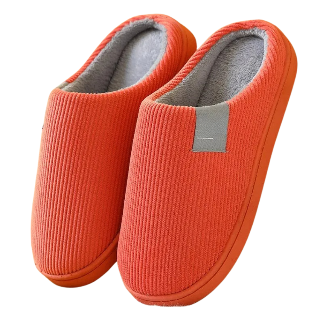 Ett par bekväma, termiska unisex-tofflor i grått med mjuk botten för hemmabruk.