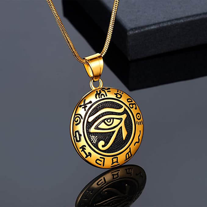 Elegant Horus öga hängsmycke i polerat rostfritt stål, med forntida egyptisk design.