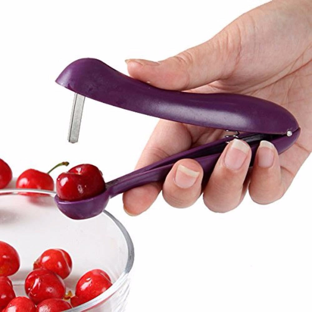 Unisex körsbärskärnare med ergonomiskt handtag för enkel fruktberedning i köket.