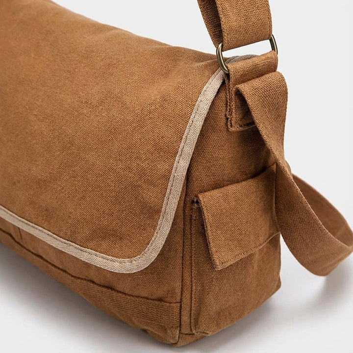 Vintage canvas skolväska i svart för unisex. Hållbar arbetsväska med plats för laptop, perfekt för studenter & jobb.