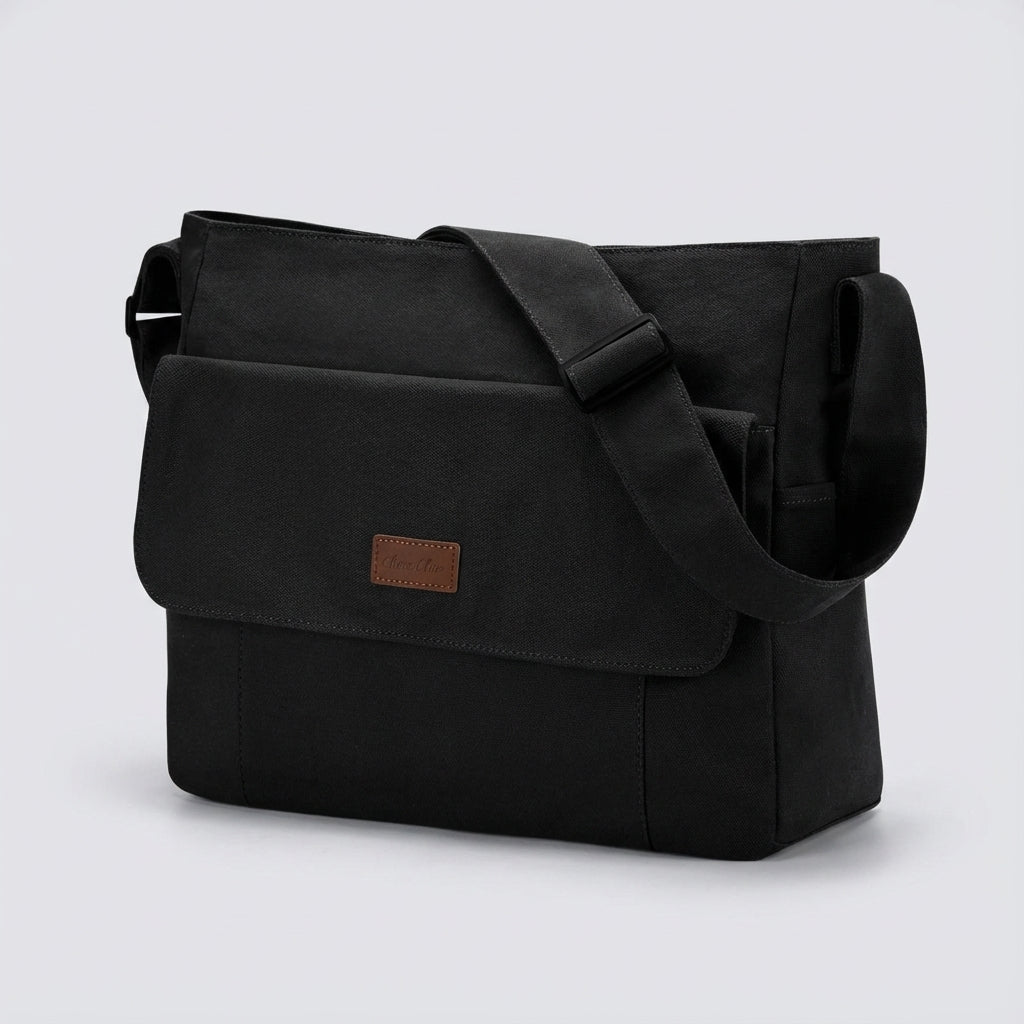 Slitstark unisex laptop axelväska, perfekt vardags- och reseväska. Crossover-stil för flexibilitet.