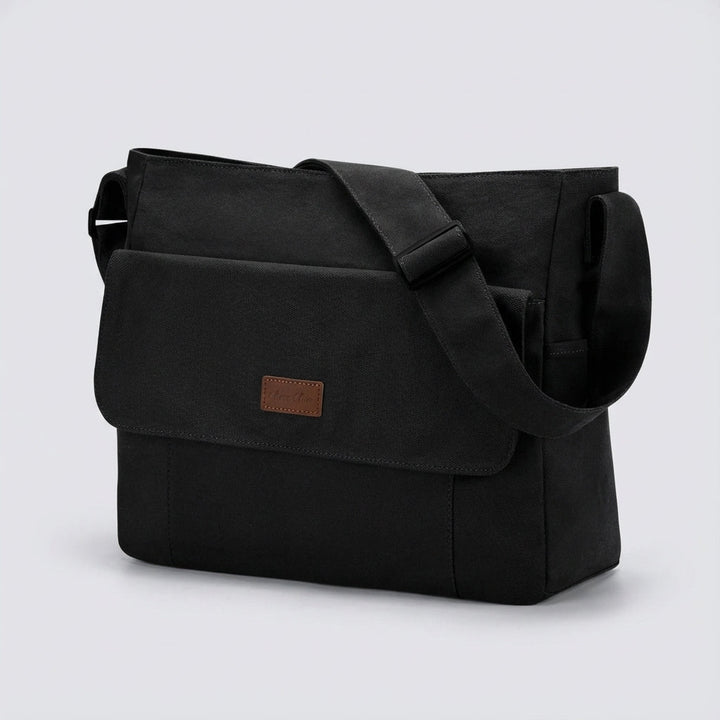 Slitstark unisex laptop axelväska, perfekt vardags- och reseväska. Crossover-stil för flexibilitet.