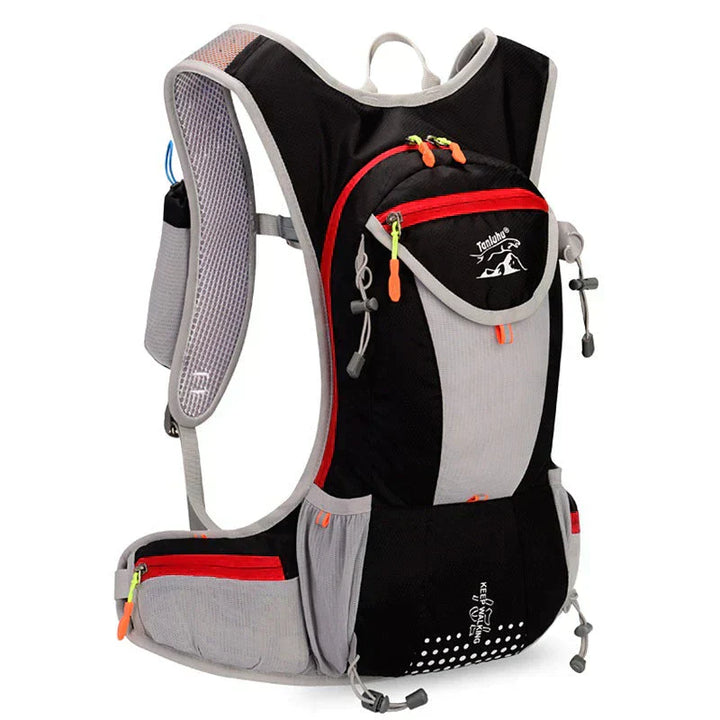 Vattentät unisex ryggsäck för sport och äventyr, med inbyggt vätskesystem.