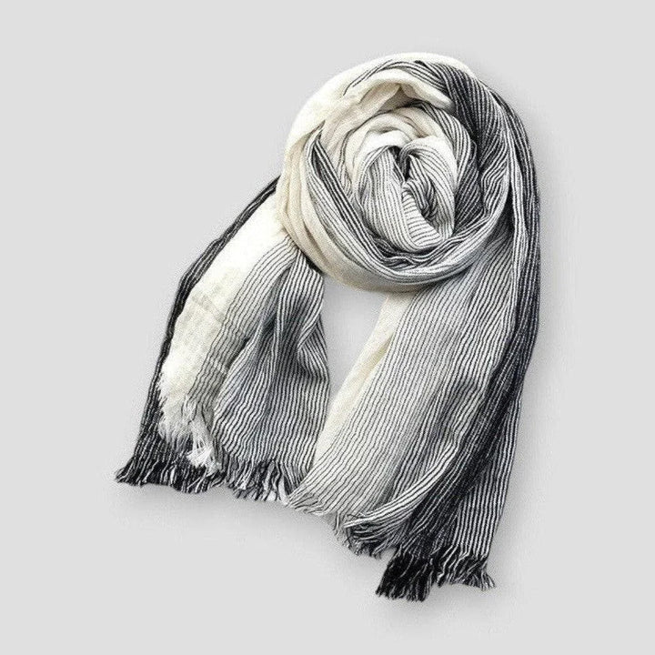 Värmande unisex halsduk med elegant mönster. Mjuk bomullsblandning, ett måste för kalla vinterdagar.