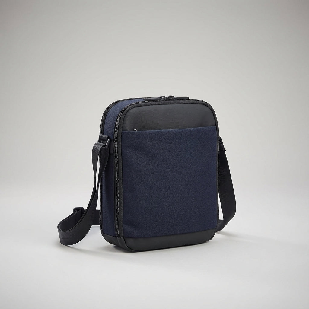 Kompakt crossbody axelväska med RFID-skydd, säkert mobilfack & nyckelhållare. Svart unisex design.