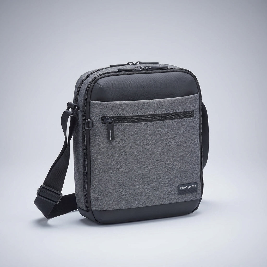 Kompakt organiseringsväska i svart. Mångsidig som messengerväska, axelväska & crossbody för alla kön.