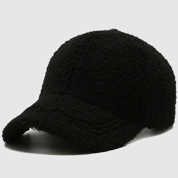 Mysig, mjuk unisex plyschkeps. Bekväm och varm huvudbonad för stilren höst- och vinterlook.