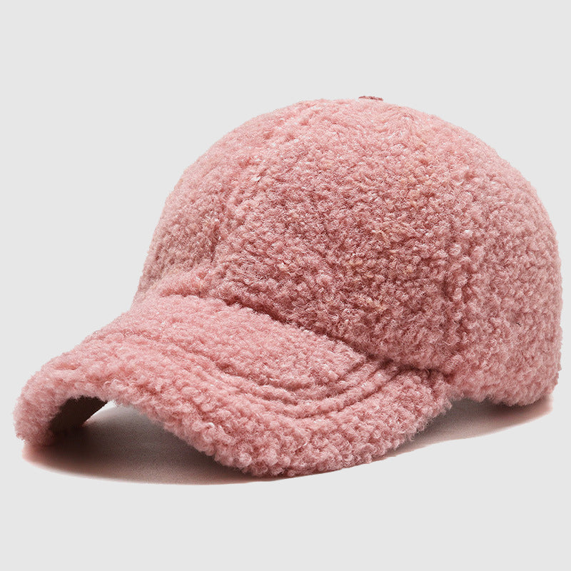 Stilren unisex plyschkeps, en trendig huvudbonad. Mjuk och varm för höst- och vintermode.
