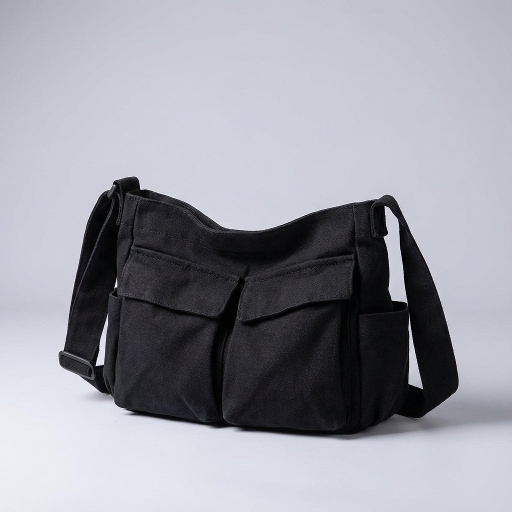 Mångsidig unisex organiseringsväska Packlite i lätt canvas. Axelremsväska/crossbodyväska med multifack.