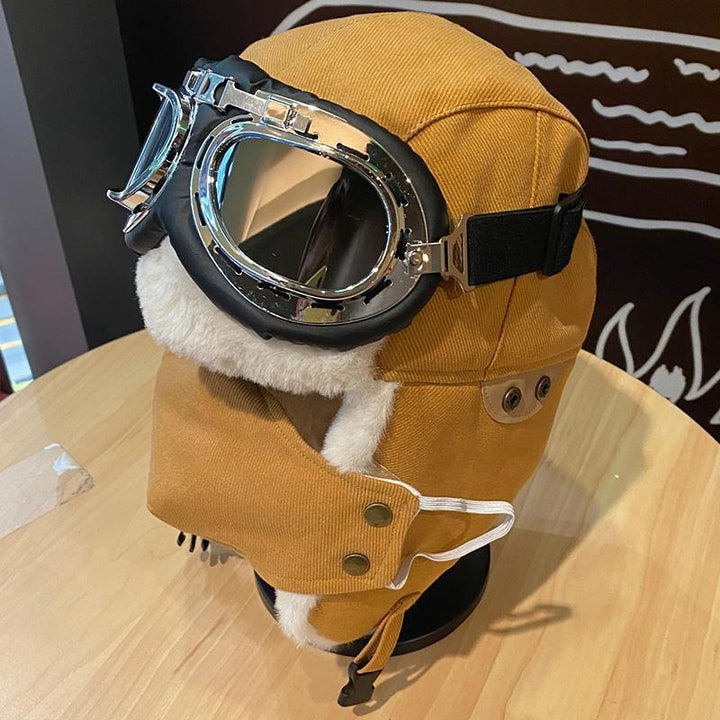 Varm unisex vintermössa med integrerade glasögon. Vindtät pilot- eller trappermössa för kallt väder.
