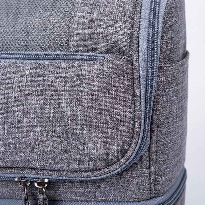 Upphängbar toalettväska med krok, dubbla fack för effektiv badrumsförvaring och enkel åtkomst på resan.