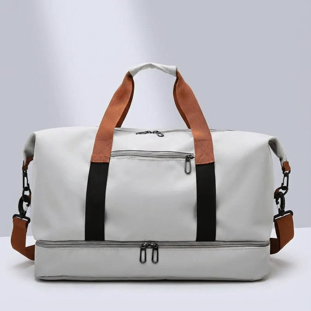 Organiserad duffelbag för gym & resor. Har våtfack, skofack & flera fickor. Svart.