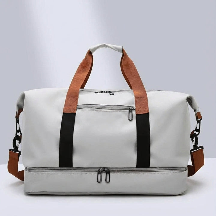 Organiserad duffelbag för gym & resor. Har våtfack, skofack & flera fickor. Svart.