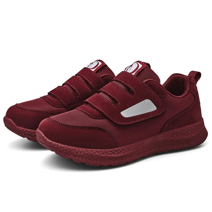 Unisex slip-on sneakers med justerbar stängning, ergonomiska & bekväma promenadskor med fotstöd.