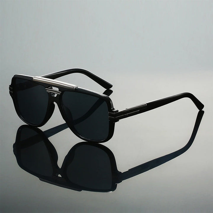 Färgglada, geometriska unisex solglasögon med UV400-skydd. Perfekta för utomhusaktiviteter och sommardagar.
