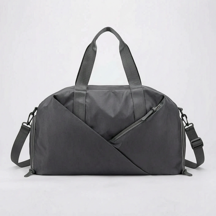 Robust sportbag/resväska med smarta fack & vattentätt material. Perfekt för gym, sport & äventyr.