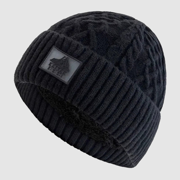 Stilren unisex stickad mössa med vikbar mudd, idealisk som vardagsmössa för höst och vinter.