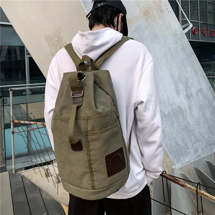 Armégrön vandringsryggsäck TrekMate i slitstark canvas, unisex & perfekt för äventyrare.