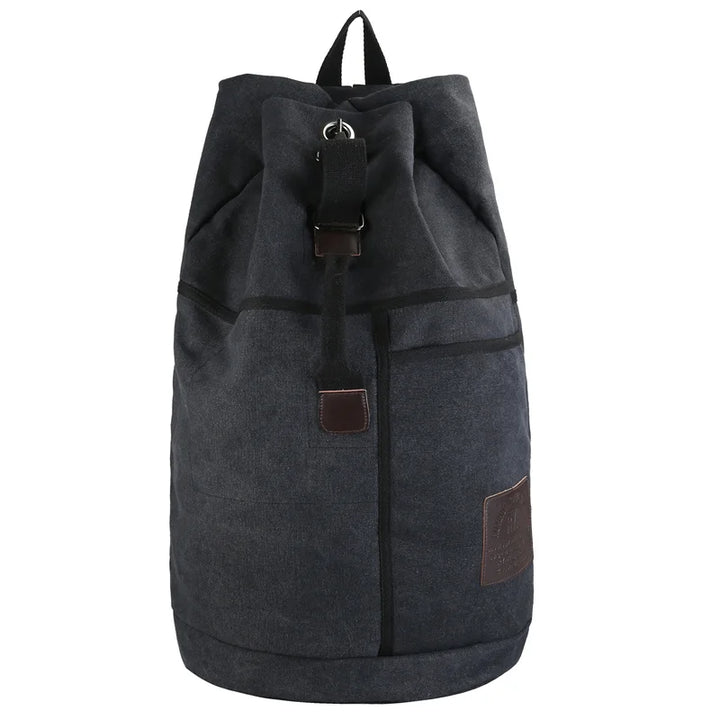 Khaki unisex vandringsryggsäck, hållbar canvas med stor packvolym för alla äventyr.