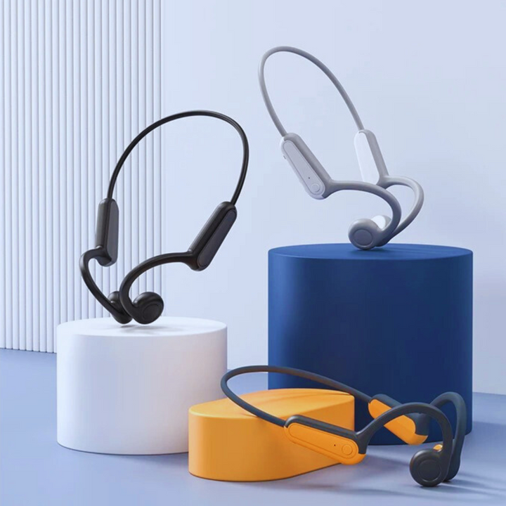 Unisex benledningslurar på en vit bakgrund, visar deras kompakta design.
