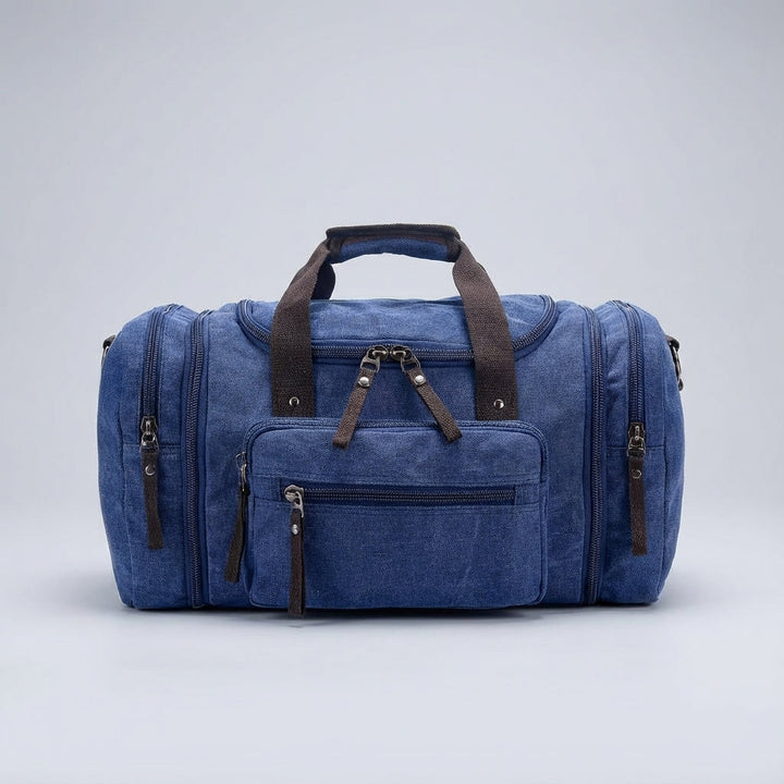 Expanderbar canvas duffelväska för weekendresa. Praktisk, slitstark unisex-väska som handbagage.