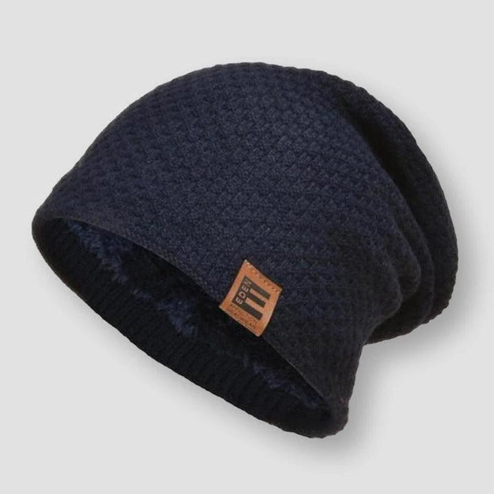 Unisex våffelstickad beanie med varmt fleecefoder, idealisk för utomhusaktiviteter i kallt vinterväder.