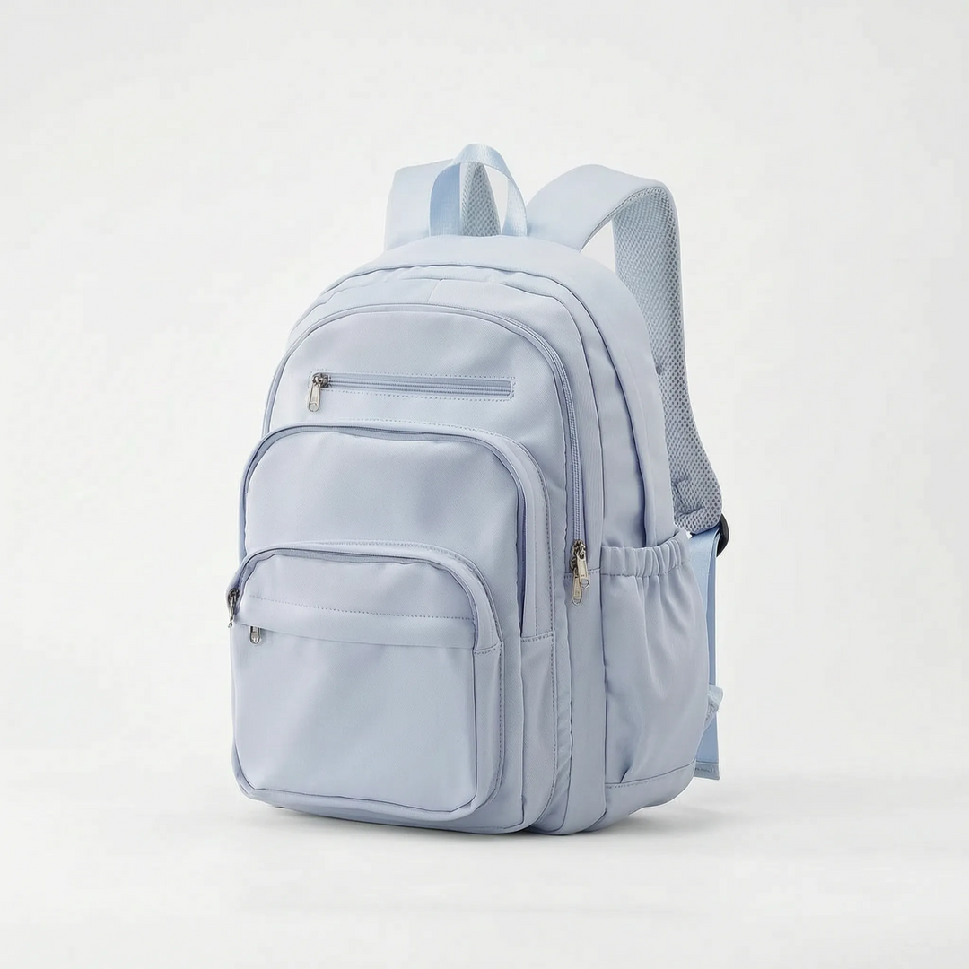 En person bär en svart unisex skolryggsäck, perfekt för pendlare och studenter som behöver en funktionell laptopväska.