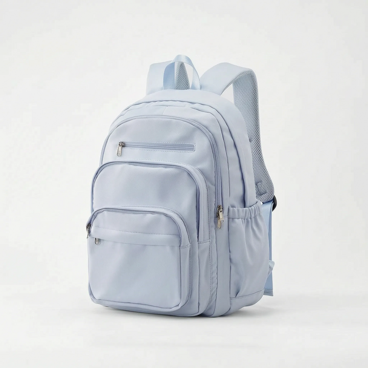 En person bär en svart unisex skolryggsäck, perfekt för pendlare och studenter som behöver en funktionell laptopväska.