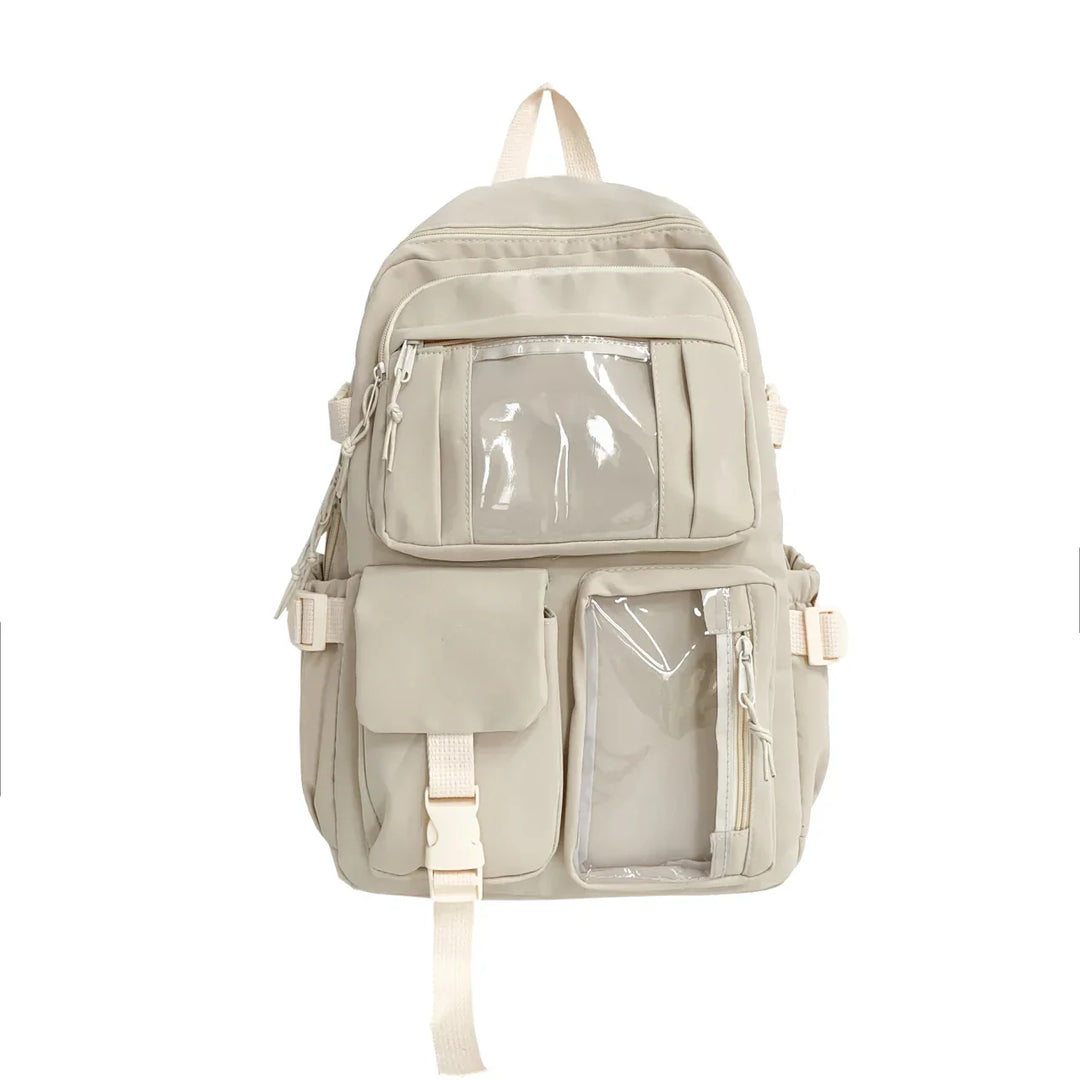 Uttryck dig med denna unisex vardagsryggsäck i oxfordtyg med displayfönster. Bekväm skolväska.