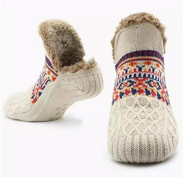 Närbild på textur av varma unisex halkfria hemmastrumpor, perfekta mysstrumpor i polyester.