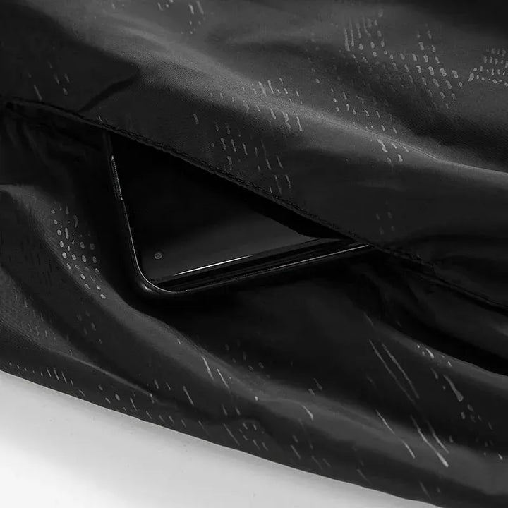 Packbar friluftsjacka, unisex, med god vattentålighet för äventyr i naturen.