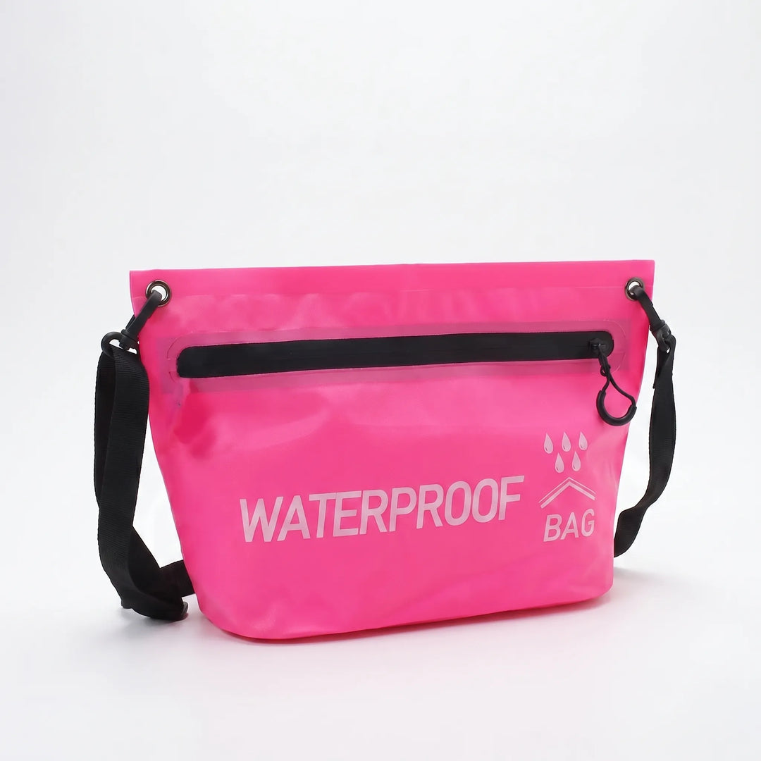 Håll dina saker torra med denna unisex vattentäta torrväska. Perfekt som crossbody- eller axelremsväska.