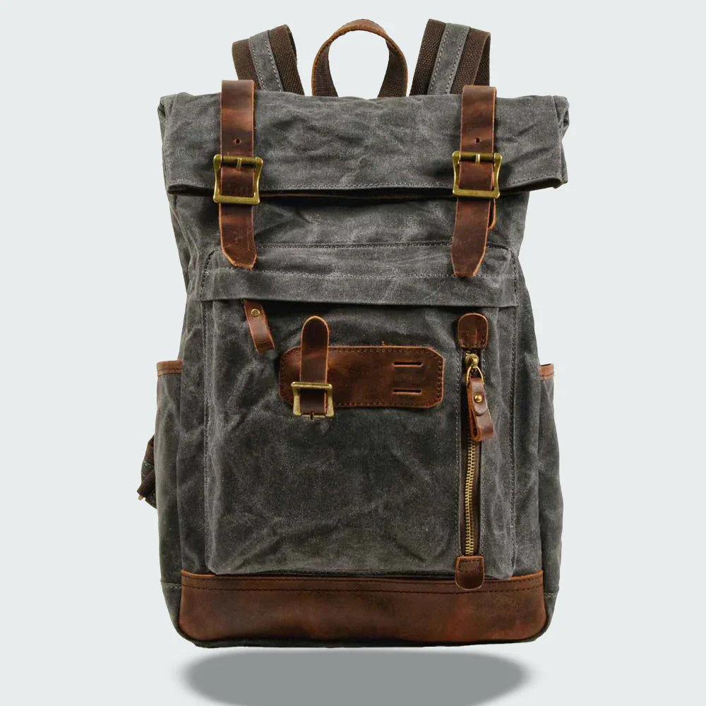 Praktisk, vikbar unisex ryggsäck i vintage canvas för resor. Rymlig för laptop, stilren och funktionell.