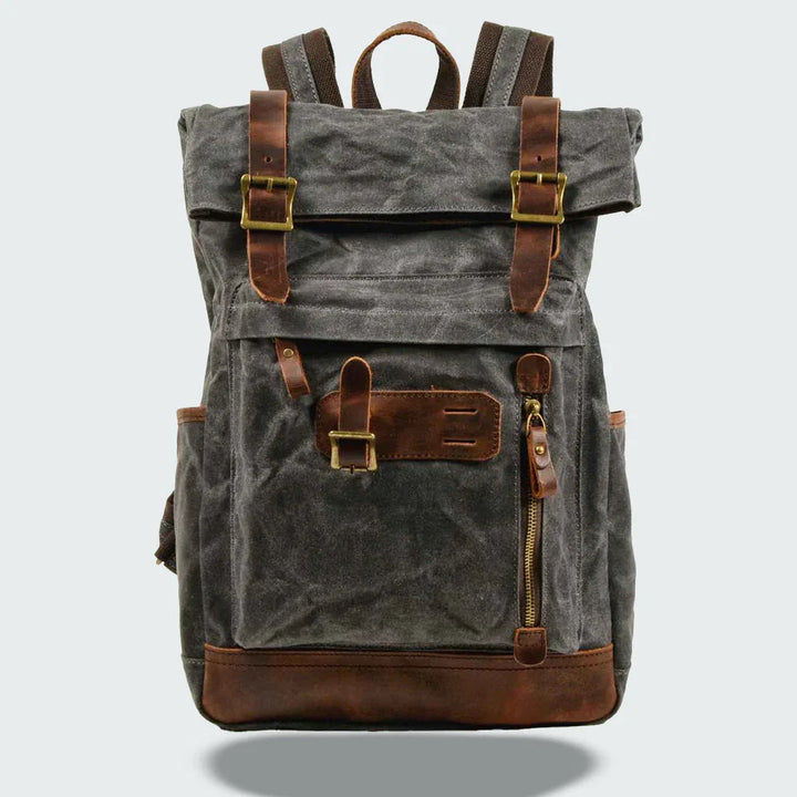 Praktisk, vikbar unisex ryggsäck i vintage canvas för resor. Rymlig för laptop, stilren och funktionell.