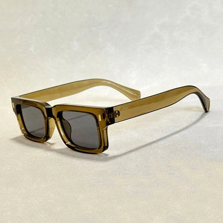 Eleganta vintage solglasögon med djärv ram, unisex modell för stil och optimalt UV400 ögonskydd.