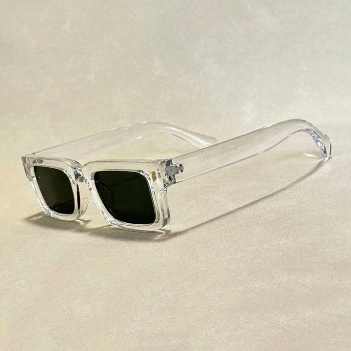 Bär dessa vintage unisex solglasögon med djärv ram för UV400-skydd och en trendig sommarlook.