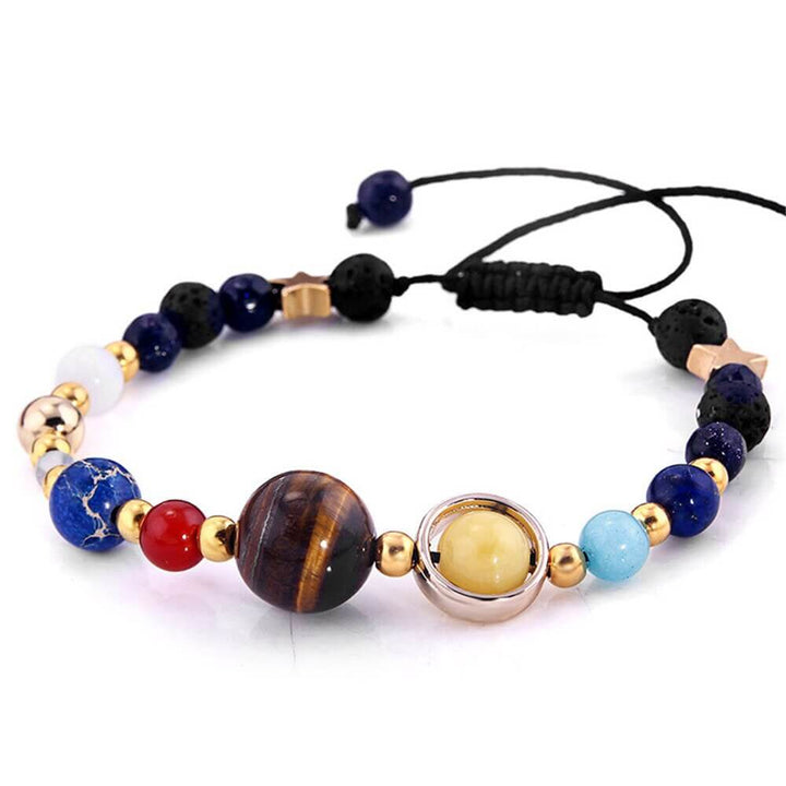 Unisexarmband med solsystemets planeter av naturstenar: Merkurius, Venus, Jorden, Mars, Jupiter, Saturnus, Uranus, Neptunus, Pluto.