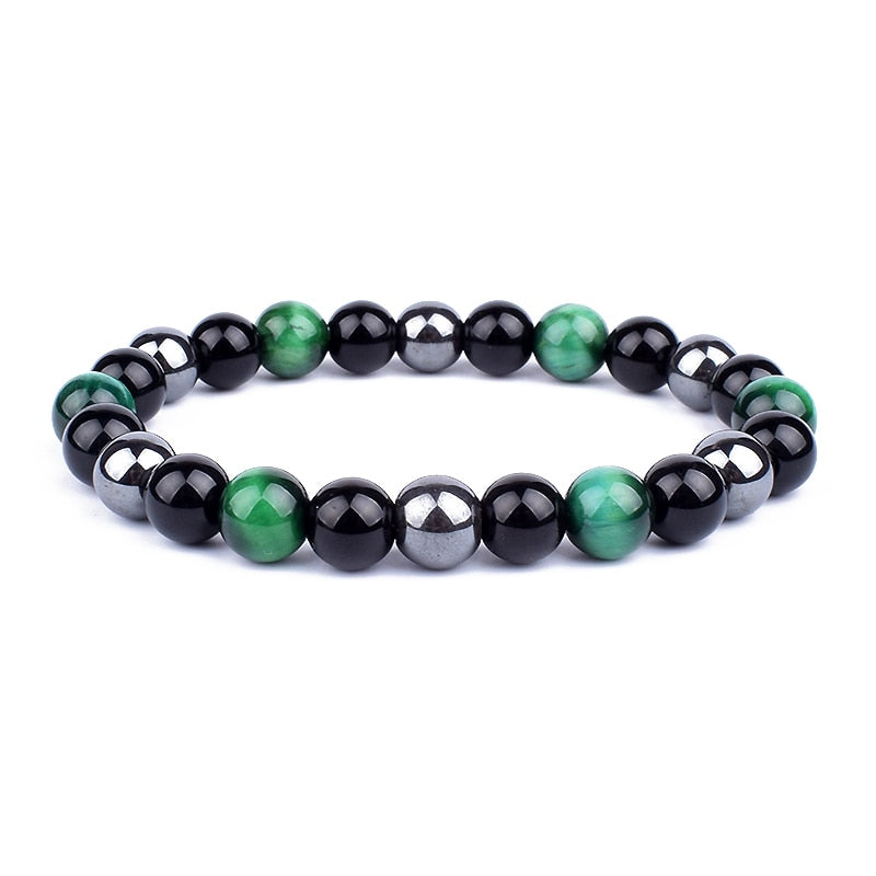 Herrarmband som visar kraften hos tigeröga, hematit och svart obsidian. Ett energigivande, skyddande chakraarmband.