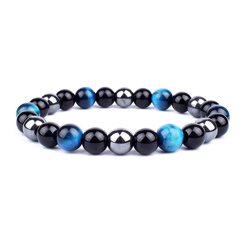 Armband med kraftfulla naturstenar. Unisex design med trippelskydd; främjar energi och balans i chakran.