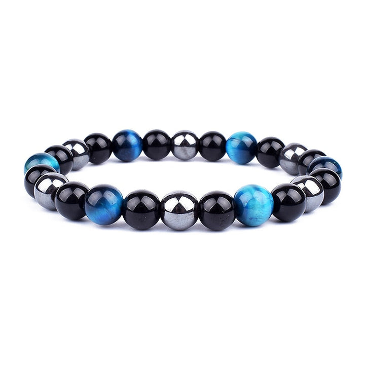 Armband med kraftfulla naturstenar. Unisex design med trippelskydd; främjar energi och balans i chakran.