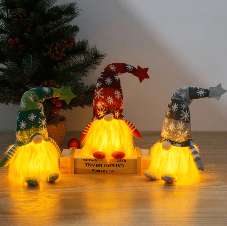 Handgjord jultomte i filt med inbyggd LED-belysning. Unikt julpynt för julen.