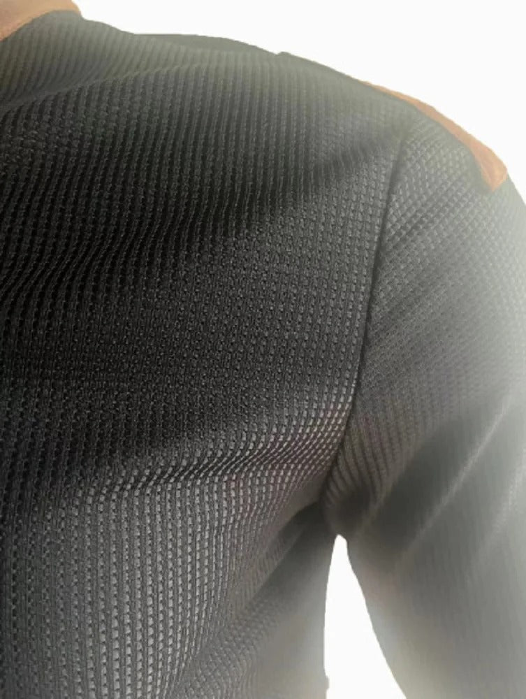 Enfärgad våfflad henley tröja, slim fit herr. Långärmad, mjukt tyg för vardagsbruk och komfort. Höst/vår.