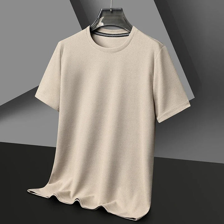 Bekväm kortärmad herr t-shirt. Våfflad textur, rund hals, perfekt för avslappnad stil och komfort.