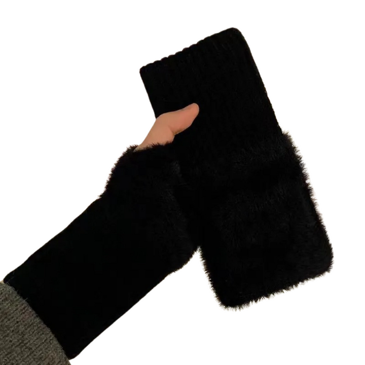 Stilrena halvfinger vantar för dam, en oumbärlig accessoir för vinterns kalla väder.