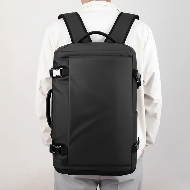Mångsidig unisex pendlarväska för laptop med integrerad USB-laddning. Vattentät och bekväm för daglig användning.