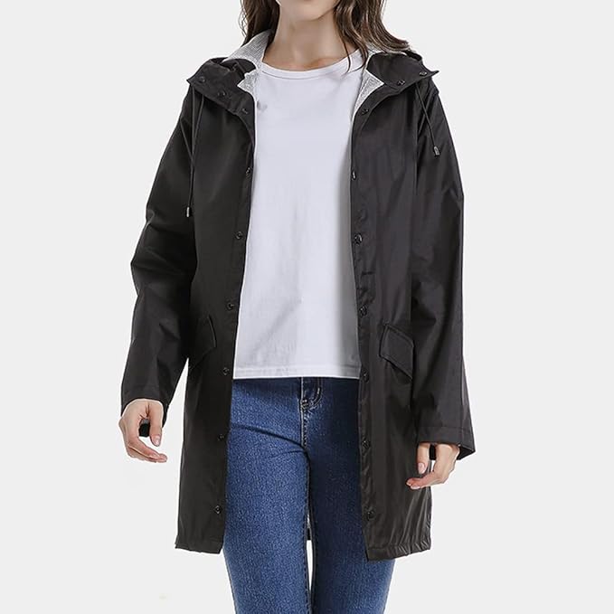 Lång trenchcoat dam: Elegant, vattentät regnjacka som erbjuder fullt skydd mot vind och nederbörd.