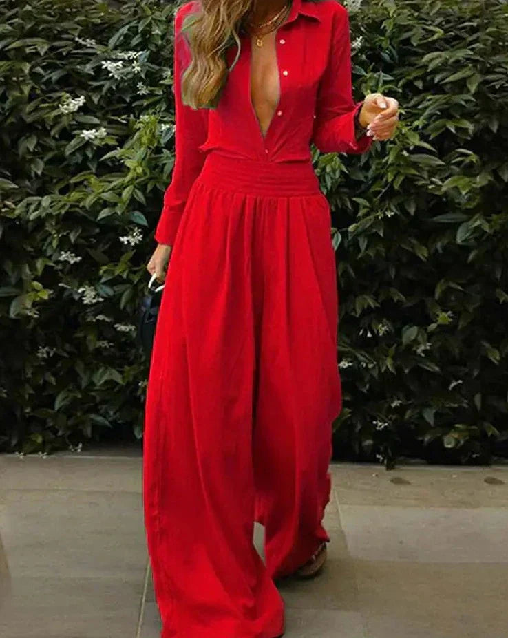 Retro byxdress för dam med bekväm elastisk midja. Stilren vintage jumpsuit, perfekt för fest eller avslappnad look.
