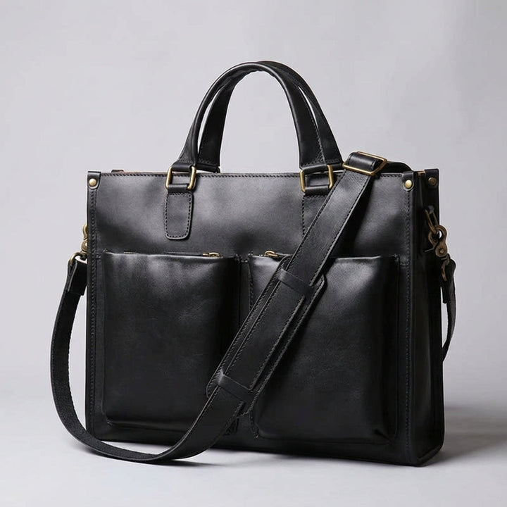 Elegant brun vintage laptopväska, 16 tum. Robust unisex affärsväska med axelrem för professionellt bruk.