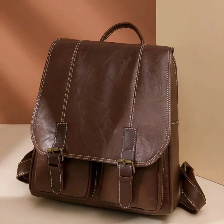 Vintage unisex ryggsäck i tidlös stil, perfekt som skolväska eller arbetsväska. Robust design för vardagsbruk.
